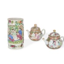 Two Chinese Canton famille rose small teapots and a reticulated brush pot Qing dynasty, 19th cen...