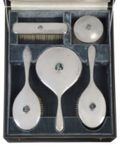 Liberty & Co  Five piece silver dressing table set inset with turquoise matrix cabochons, model ...