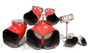 Staccato Drum Company  Scarce part drum kit in red lacquered finish, comprising bass drum, floor...