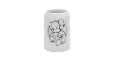 KAWS, American b.1974- NovemberFest Beer Stein, 2011; ceramic beer stein, with printed signatur...