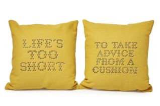 Banksy, British b.1974- Cushions, 2019; a pair of Gross Domestic Product cushions, unique hand ...