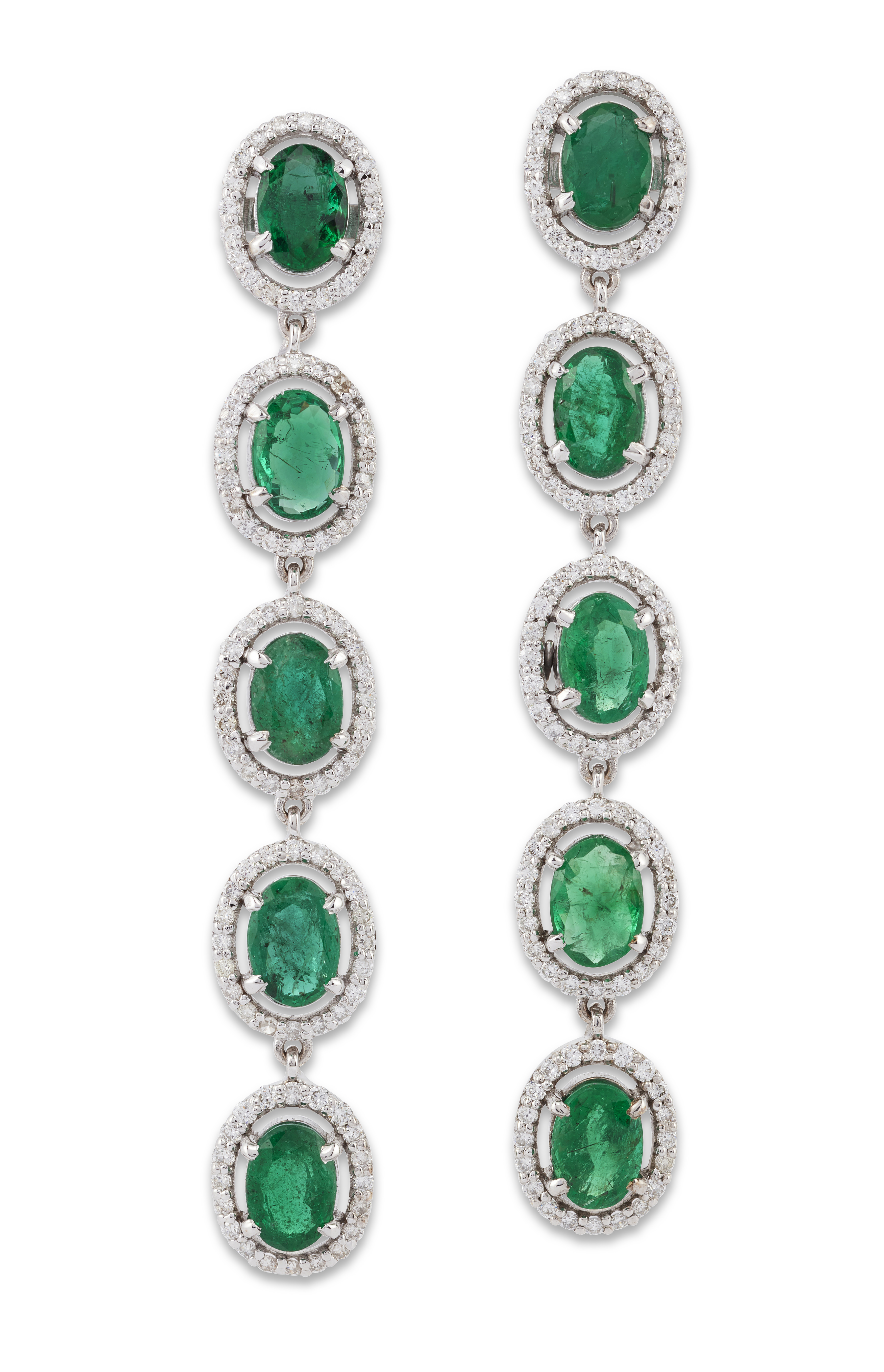 A pair of 18ct white gold emerald and diamond drop earrings, designed as a series of articulated ...