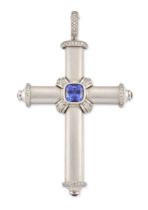 Theo Fennell. An 18ct white gold tanzanite and diamond cross pendant, a central cushion cut tanza...