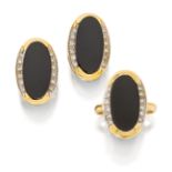 A pair of onyx and diamond earrings and ring, the earrings of oval onyx panel form with single-cu...