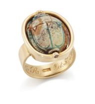 An early 20th century gold scarab ring, the Egyptian composite scarab bead in swivel mount, to pl...