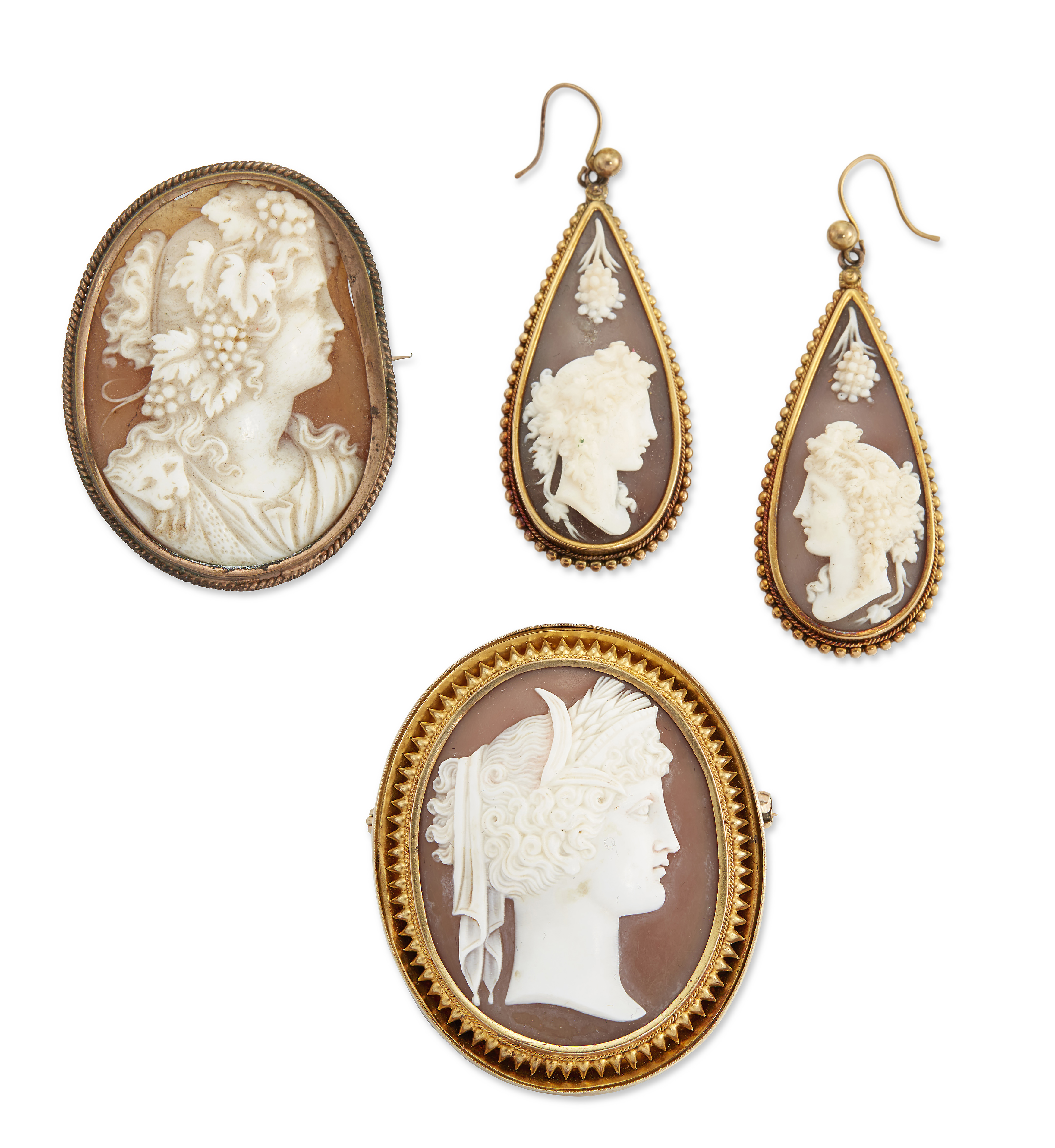 A group of 19th century cameo jewellery, comprising: an oval shell cameo brooch depicting the hea...