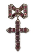 A 17th century silver garnet cross pendant, the Latin cross closed set with rectangular-cut garne...