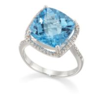 A blue topaz and diamond ring, the cushion shaped chequer cut blue topaz, approximately 11.7mm, c...
