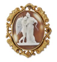 A Victorian gilt mounted shell cameo brooch, the oval cameo carved to depict the classical standi...