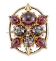 A Victorian gold garnet brooch, set with eight cabochon garnets three of these mounted with rose-...