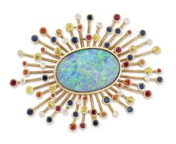 Theo Fennell. An 18ct gold opal, diamond and gem set starburst brooch, with an oval cabochon opal...
