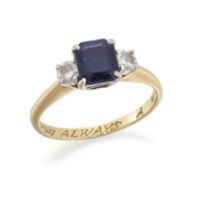 An 18ct gold, sapphire and diamond three stone ring, the emerald-cut sapphire with brilliant-cut ...