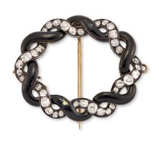 A late Victorian diamond and enamel brooch, of old mine-cut diamond and black enamel entwined gar...