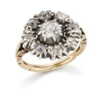 A Georgian diamond cluster ring, converted from a button, the central silver mounted closed-set o...