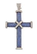 Theo Fennell. An 18ct white gold sapphire and diamond cross pendant, pavé set with round mixed cu...