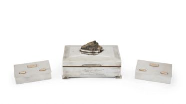 A silver cigarette box Deakin & Francis Birmingham, 1961 of rectangular form, presentation eng...