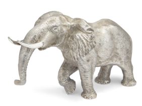 A silver model of an African elephant Edward Barnard & Sons London, 1975 Realistically designe...