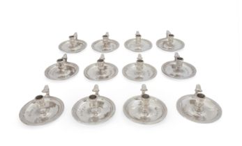 A set of twelve Britannia silver chambersticks David Tappenden London, 2000 Of circular form, ...