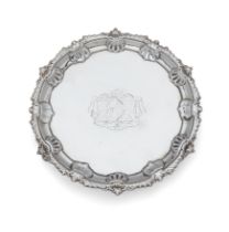 A George II silver waiter Ebenezer Coker & Thomas Hannam London, 1759 Of circular form, with g...