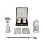 A group of silver including napkin rings and a wager cup The group comprising: a cased set of si...