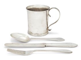 A silver christening cup and cutlery set Tiffany & Co. The cup designed as a reproduction of an...