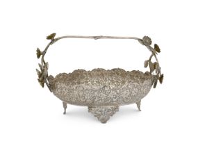 A large Iranian (Persian) centrepiece bowl with trailing flower handle Stamped 90 (in Arabic scr...