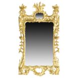 A George III giltwood mirror, third quarter 18th century, the frame carved with rosettes, C and S...