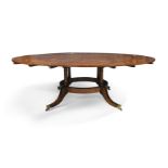 An English mahogany circular concentric extending dining table, in the manner of Jupe, probably b...