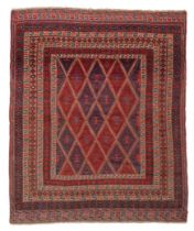 An Afghan belouch rug, third quarter 20th, part flat woven, the central field with repeating diam...