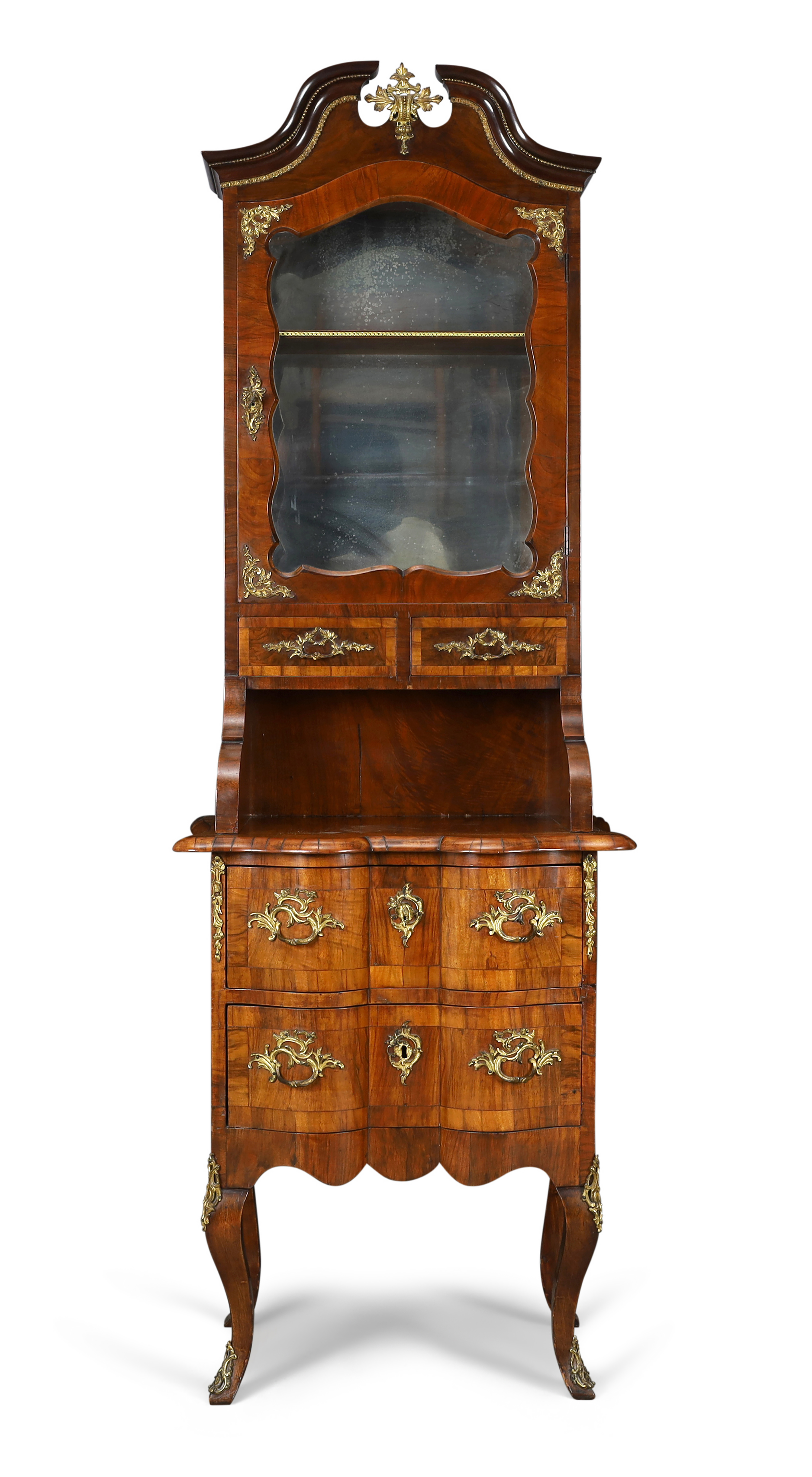A French gilt-brass mounted walnut vitrine on chest, of Louis XV style, 19th century, the broken ...