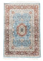 A Turkish silk Kayseri rug, last quarter 20th century, the central field with floral medallion su...