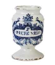 A Dutch Delft ceramic blue and white drug jar, c.1740, inscribed P MERCURIA within an elaborate c...