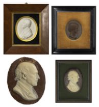 An early Victorian plaster portrait relief of Dr Thomas Bland, in a later gilt and ebonised mount...