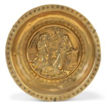 A German brass alms bowl, Nuremberg, first half 16th century, with a depiction of the Annunciatio...