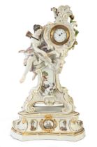 A Meissen porcelain rococo clock-case and a stand, 19th century, traces of blue crossed swords ma...