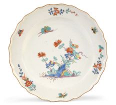 A Chelsea porcelain plate, c.1752-58, red anchor mark, painted in the Kakiemon palette with flowe...