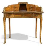 A French kingwood kidney table a ecrire, of Louis XV style, first quarter 20th century, with gilt...