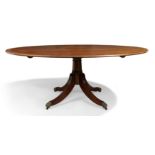 An English mahogany circular dining table by Arthur Brett, George III style, 20th century, the cr...
