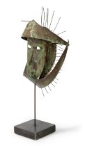 A sheet metal stylised head, second half 20th century, unsigned, on painted composition base, 56c...