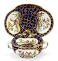 A Sèvres porcelain dark-blue-ground two-handled écuelle, cover and stand, 1763, blue interlaced L...