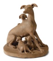 Joseph Gott, British, 1786-1860, a terracotta group of a seated greyhound with her three young pu...