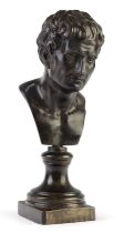 A bronze bust of a Roman nobleman, possibly Julius Caesar, early 19th century, on a socle, 22cm h...