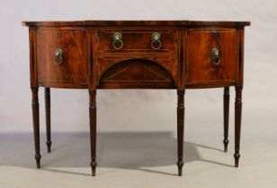 A George III inlaid mahogany breakfront sideboard, last quarter 18th century, with three drawers ...