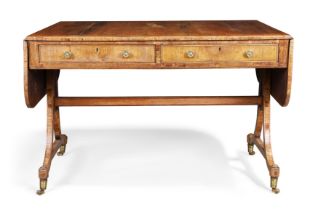 A George III rosewood sofa table, first quarter 19th century, the rounded rectangular twin-flap t...