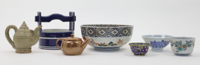 A group of Chinese, Japanese and Thai ceramics and a small Chinese cloisonné-enamel cup, 18th - 2...