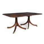 An English mahogany twin pedestal dining table by William Tillman, George III style, 20th century...