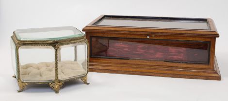 A mahogany rectangular table-top display case, 20th century, with red velvet lining and glazed to...