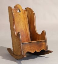 An English mahogany child’s rocking chair, 19th century