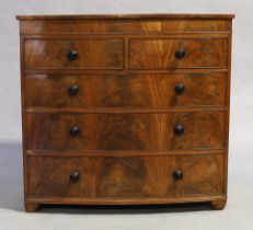 A Victorian mahogany bow front chest, third quarter 19th century, with three frieze drawers above...