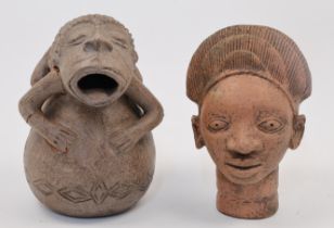 An Ife terracotta bust, Nigeria, 20th century, depicting a woman with elaborate coiffure, 23.5cm,...